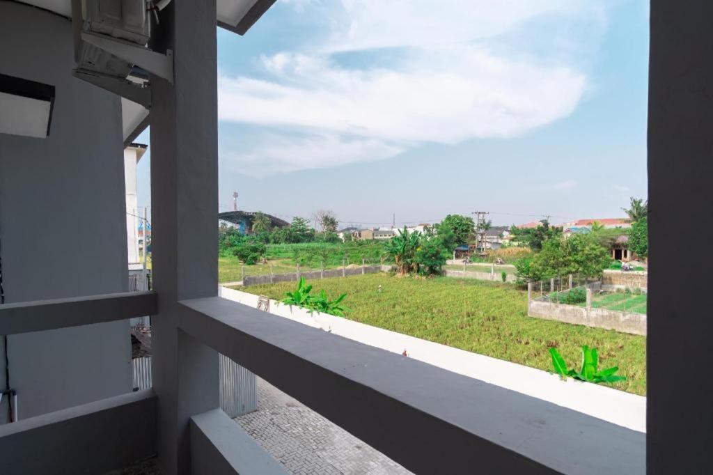Capital O 92444 Kamojo Guest House Medan Bagian luar foto